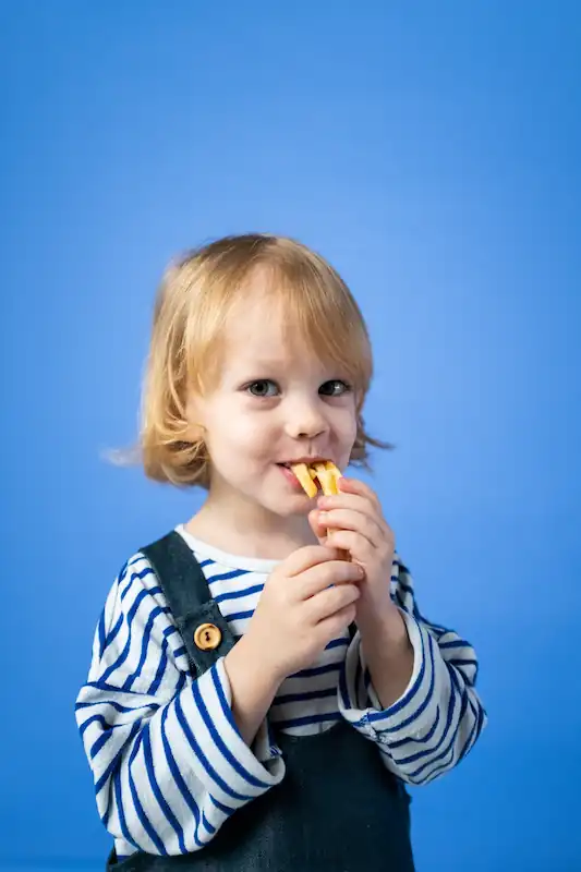 Kid Eating Fries