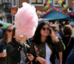 Lady carrying a big candy floss