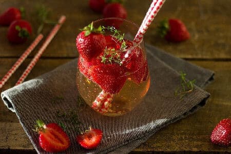 Gin and Tonic with strawberry garnish
