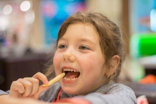 Girl Eating Chips